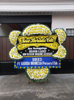 Papan Bunga Duka di Kosiwo